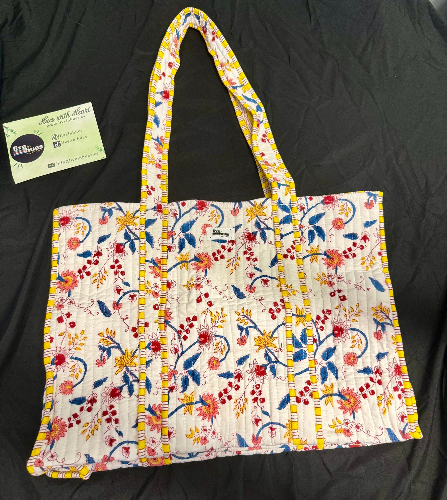 Floral patterned bag on a black background