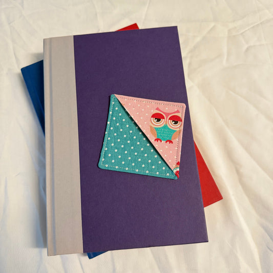 Stack of colorful greeting cards on a textured surface