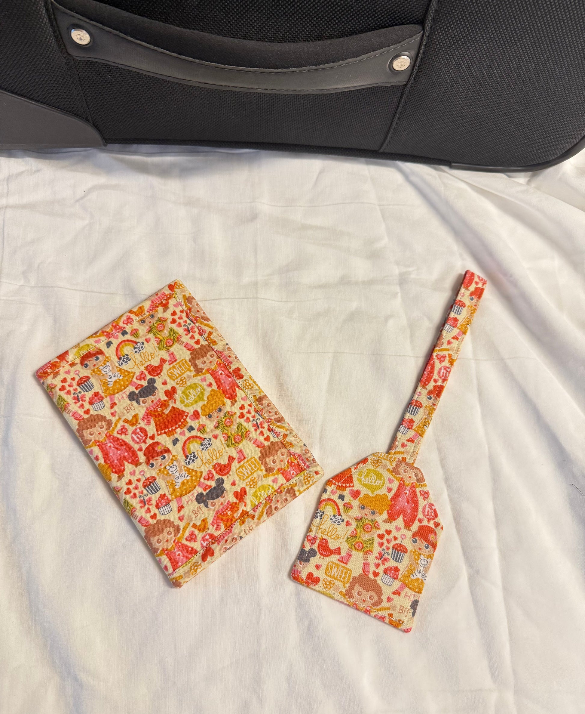 Two floral-patterned coasters on a textured surface