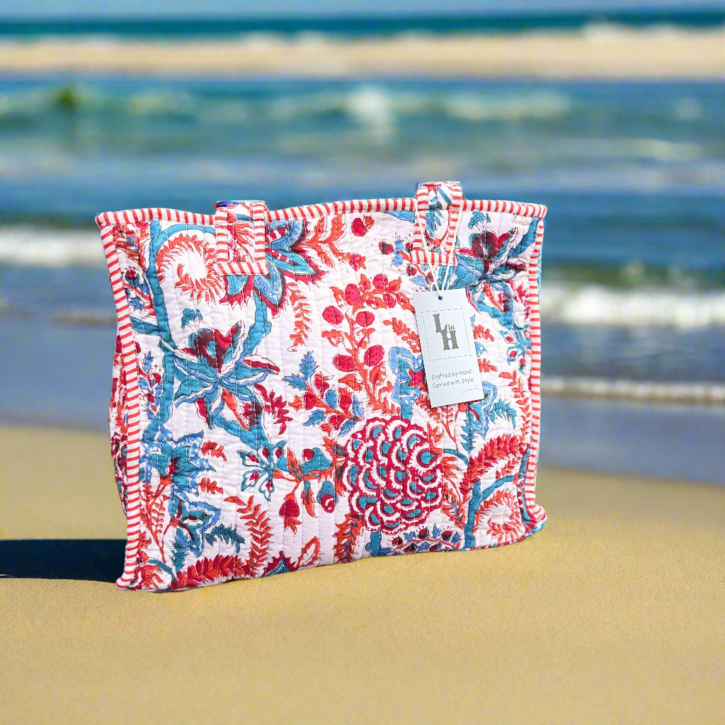 Floral patterned pouch on a wooden surface with a blurred natural background